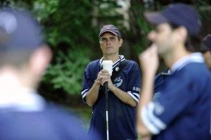 Damon Graff of Brookline, who is blind, listens to Boston Renegades head coach Rob Weissman (near right) during practice at Filippello Field in Watertown on Sunday,July 27, ahead of their World Series trip to Minnesota. Due to a recent surgery, Graff has been unable to play this season with the Renegades, New England's only beep ball team. Wicked Local Staff Photo / Brett Crawford
